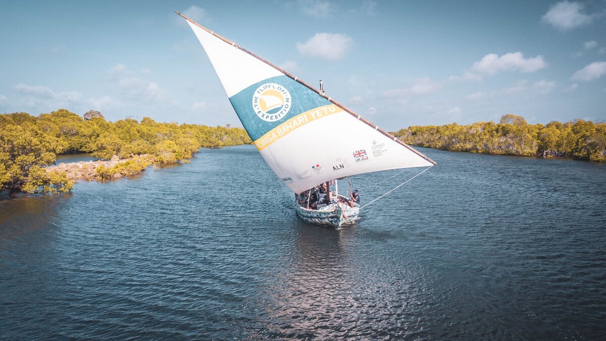 Multicoloured sailing dhow made from waste material, found washed up on Lamu shores, Kenya. Image: Flip-flop