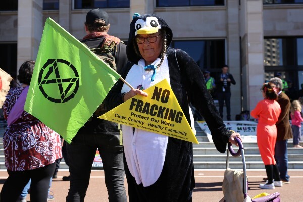 UK climate campaigners threaten legal action over fracking U-turn