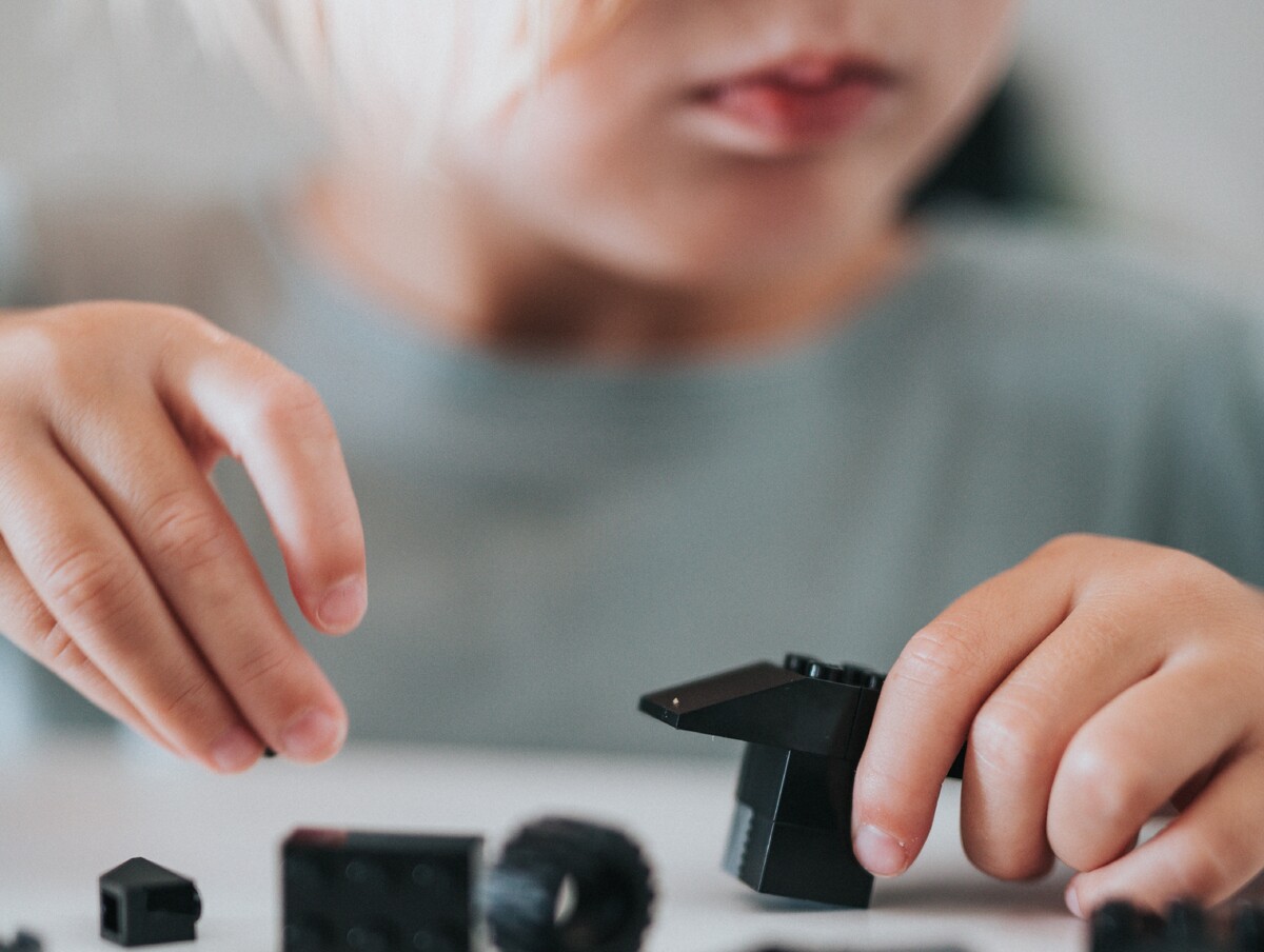 Child playing with toys. Nathan Dumlao Unsplash.jpg